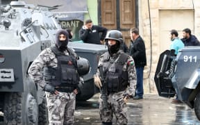 Jordanian security forces in Karak, a day after the initial shooting that left 10 people dead.