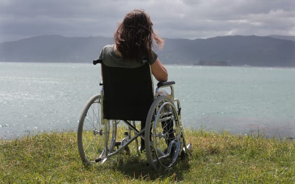 080114. Photo Diego Opatowski / RNZ. Model posing as a disabled on a wheelchair looking at the ocean.