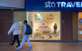 Art installation "Inhabit" in a shopfront in Wellington with artist Holli McEntegart and her toddler and baby