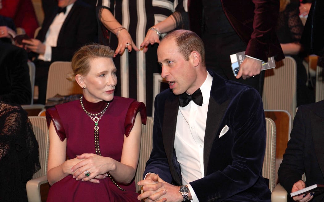Britain's Prince William, Prince of Wales, president of Bafta, speaks with US-Australian actress Cate Blanchett during the BAFTA British Academy Film Awards at the Royal Festival Hall, Southbank Centre, in London, on February 18, 2024. (Photo by Jordan Pettitt / POOL / AFP)
