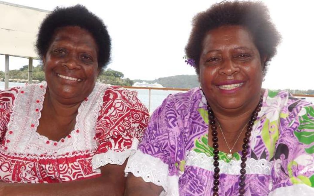 Leimara Malachi  and Marie Kalkoa.