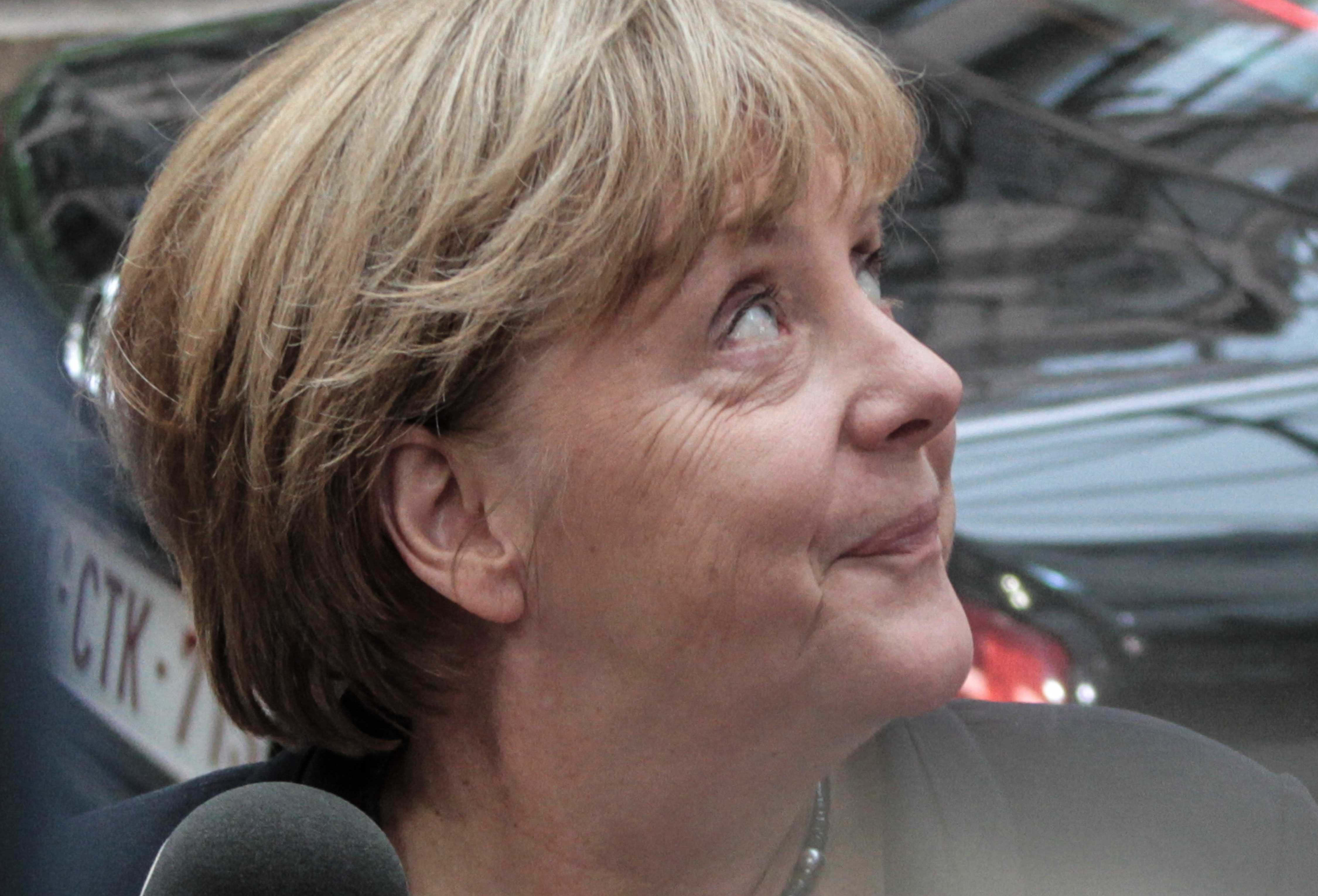 German chancellor Angela Merkel arrives for an emergency Greek summit with Eurogroup finance ministers and European leaders in Brussels.