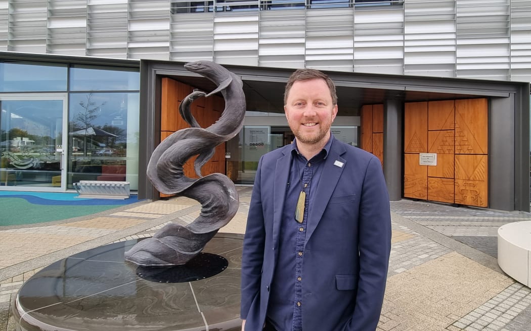 Selwyn mayor Sam Broughton pictured outside Te Ara Ātea, Rolleston's public library and community hub.