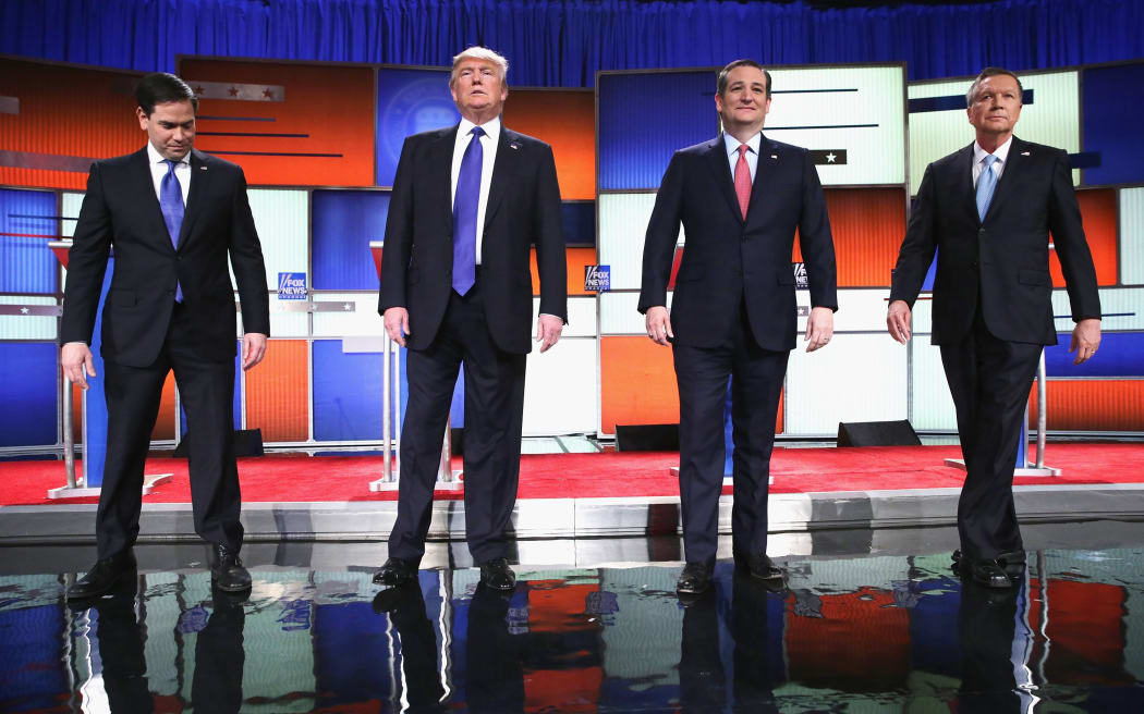 Republican presidential candidates (Lto R) Sen. Marco Rubio (R-FL), Donald Trump, Sen. Ted Cruz (R-TX), and Ohio Gov. John Kasich, participate in a debate sponsored by Fox News on March 3, 2016 in Detroit, Michigan. Voters in Michigan will go to the polls March 8 for the State's primary.