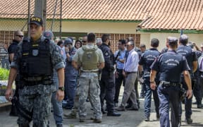 Police say the motive for the shooting at the Brazilian school is so far unclear.