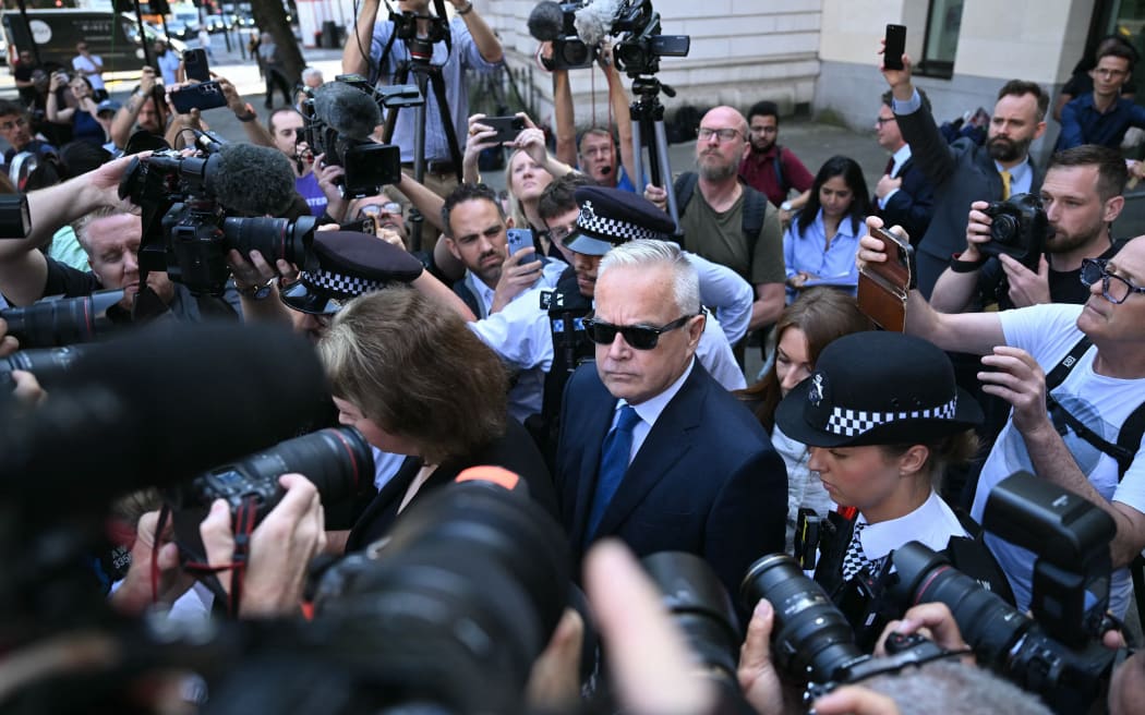 Former BBC news anchor Huw Edwards leaves after a hearing at Westminster Magistrates' Court in London on July 31, 2024. Edwards, one of the most recognisable faces on UK television, pleaded guilty to three counts of making indecent images of children. The 62-year-old, who resigned from the BBC in April on "medical advice", six months after he was initially arrested, admitted committing the offences between December 2020 and April 2022. (Photo by JUSTIN TALLIS / AFP)