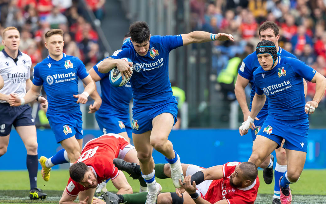 Italy’s Tommaso Menoncello in action against Wales.