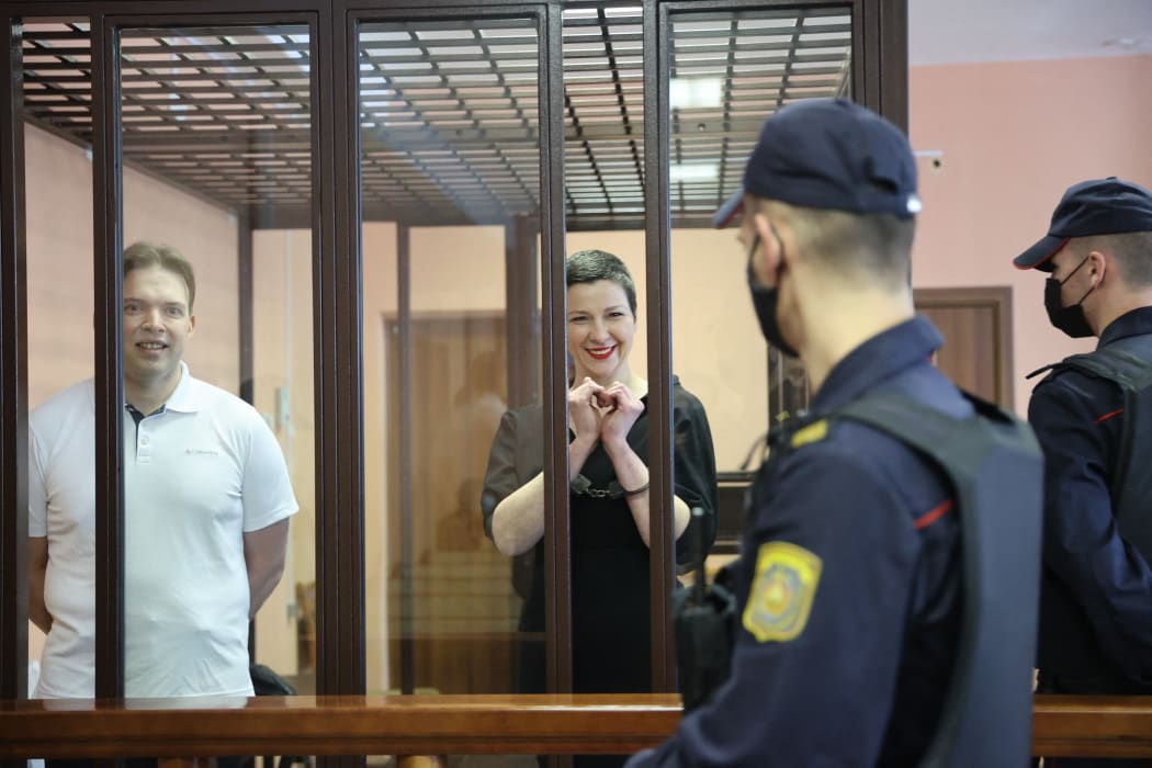 Belarusian opposition activists Maxim Znak (L) and Maria Kolesnikova (2nd L), who are members of the Presidium of the oppositions Coordination Council, appear for a sentencing hearing at the Minsk Region Court in Minsk, Belarus on September 06, 2021.