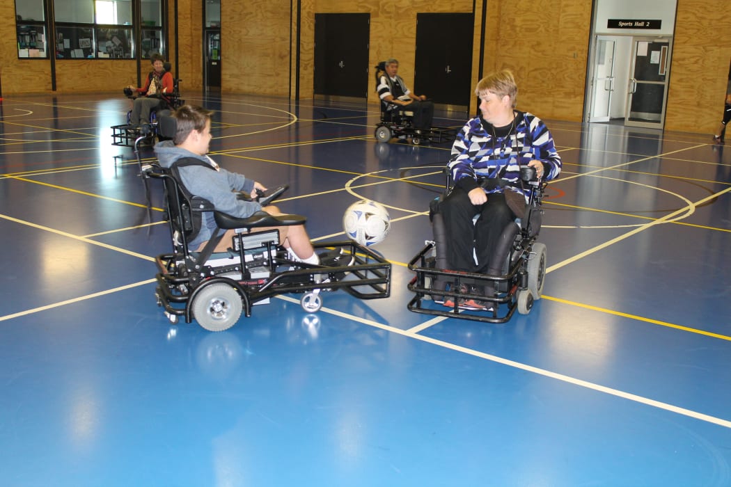 Luke Alderton and Diane Williams. The powerchairs reach up to 10kmph during a fierce competition.