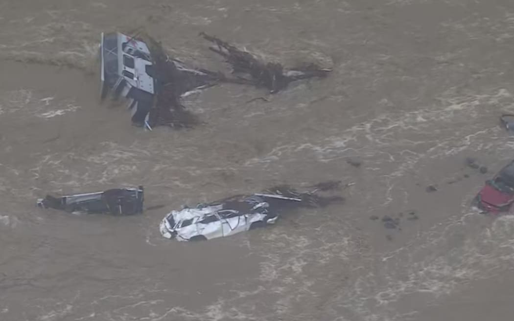 Cars were swept out to sea, and a caravan park was flooded after torrential rain battered communities along Victoria's Great Ocean Road.