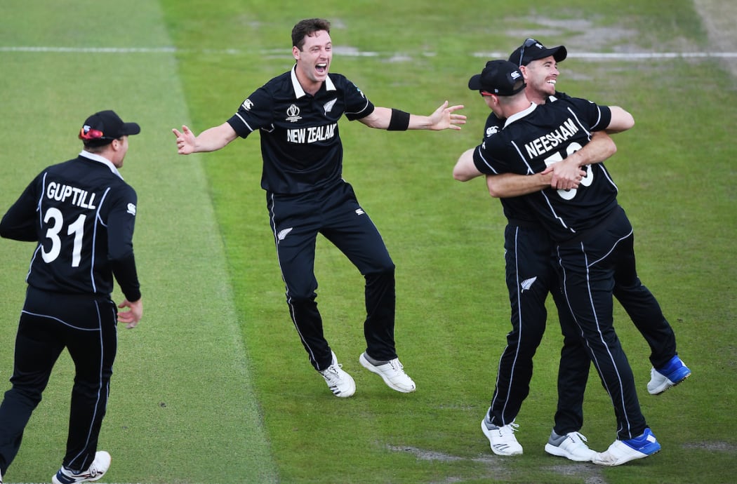 Matt Henry celebrates the dismissal of Karthik and Neesham's catch during the Black Caps semifinal win over India at Old Trafford.
