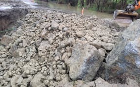 Subsidence on State Highway 35 was temporarily repaired after damage from heavy rain.
