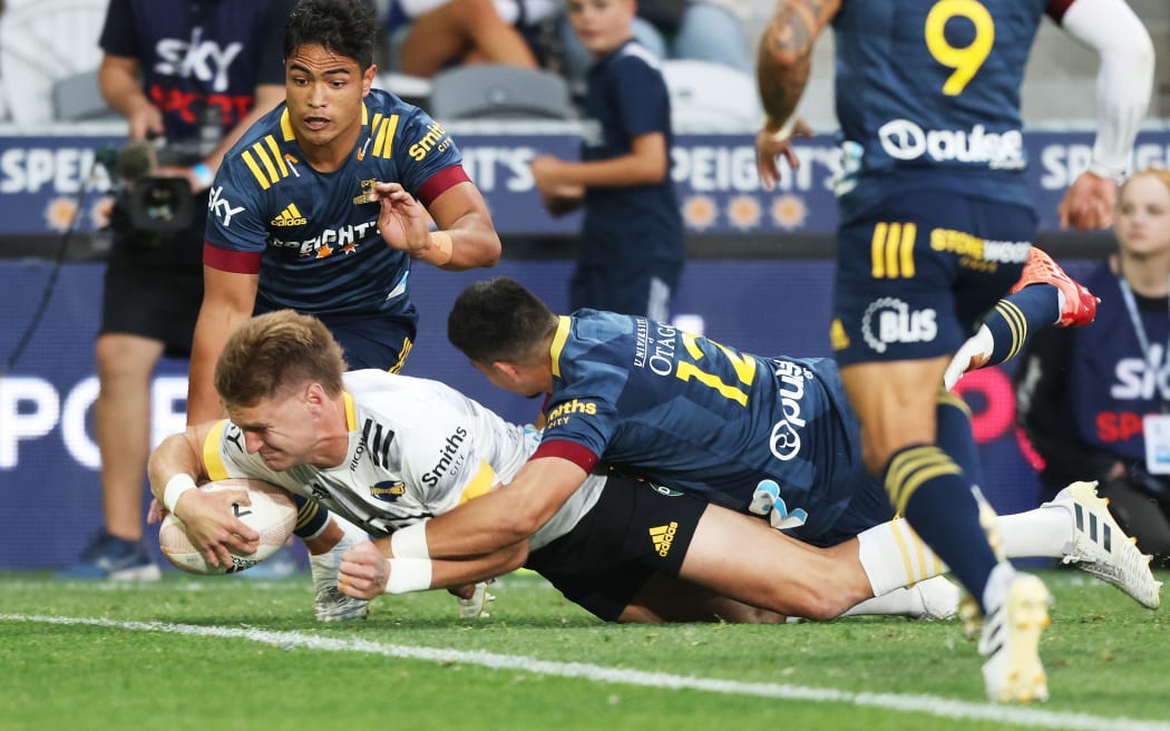 Hurricanes fullback Jordie Barrett scores against the Highlanders in Dunedin.