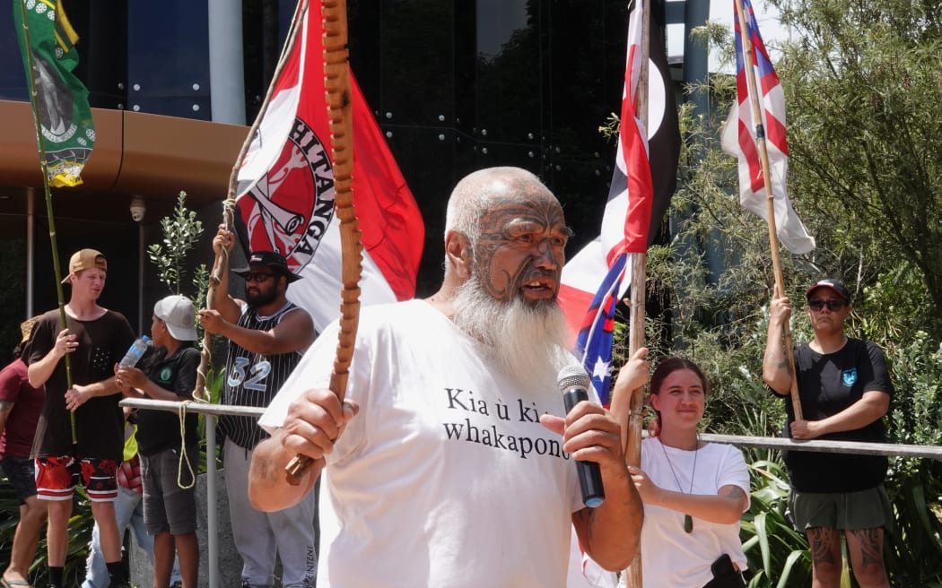 Kaumātua Te Haerengamai Rikihana leads a karakia after Friday’s hīkoi through Kaitāia.