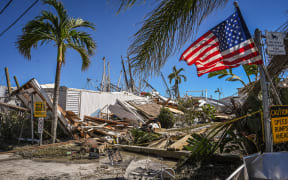 Part of a destroyed mobile home park is pictured in the aftermath of Hurricane Ian in Fort Myers Beach, Florida on September 30, 2022. - Forecasters expect Hurricane Ian to cause life-threatening storm surges in the Carolinas on Friday after unleashing devastation in Florida, where it left a yet unknown number of dead in its wake. After weakening across Florida, Ian regained its Category 1 status in the Atlantic Ocean and was headed toward the Carolinas, the US National Hurricane Center said Friday. (Photo by Giorgio VIERA / AFP)