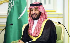 This pool photograph distributed by Russian state agency Sputnik shows Saudi Crown Prince Mohammed bin Salman attending a meeting with Russia's President in Riyadh on December 6, 2023. (Photo by Sergei SAVOSTYANOV / POOL / AFP)