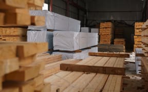 Stacked wooden boards.