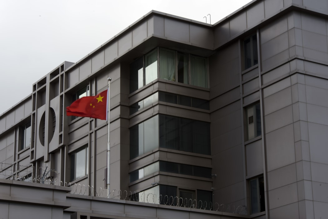 The Chinese flag flies outside the Chinese consulate in Houston after the US State Department ordered China to close the consulate in Houston on 22 July 2020.