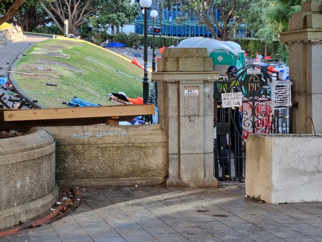 Rubbish and signs left at Parliament grounds are seen on 3 March, 2022, in the aftermath of the three-week occupation by protesters.