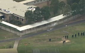 Police in the process of resolving an ongoing riot at a juvenile detention centre in Kariong