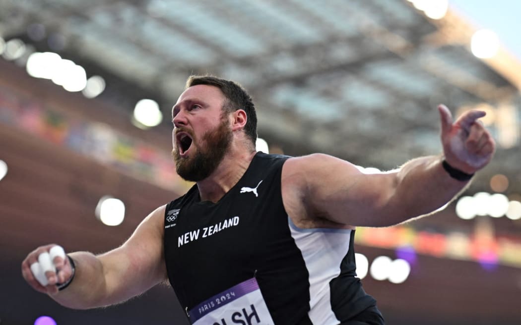 New Zealand's Tom Walsh competes in the men's shot put qualification of the athletics event at the Paris 2024 Olympic Games at Stade de France in Saint-Denis, north of Paris, on August 2, 2024. (Photo by Ben STANSALL / AFP)