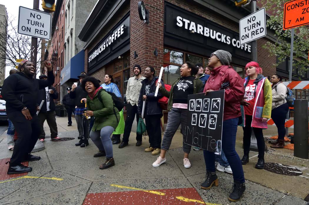Protesters gather on April 16, 2018 for a protest at the Starbucks location in Center City Philadelphia.