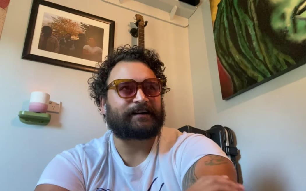 Troy Kingi accepting the 202 Taite Prize via video link