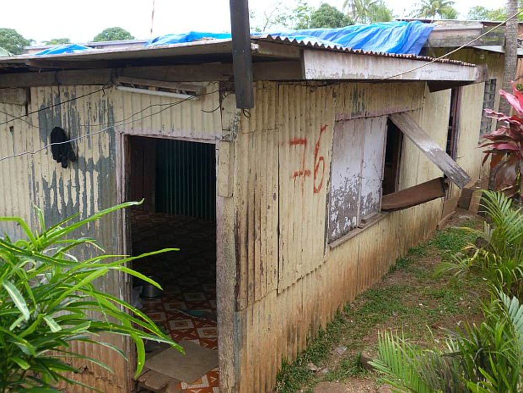 A very basic corrugated iron shack  in one of Suva's squatter settlements