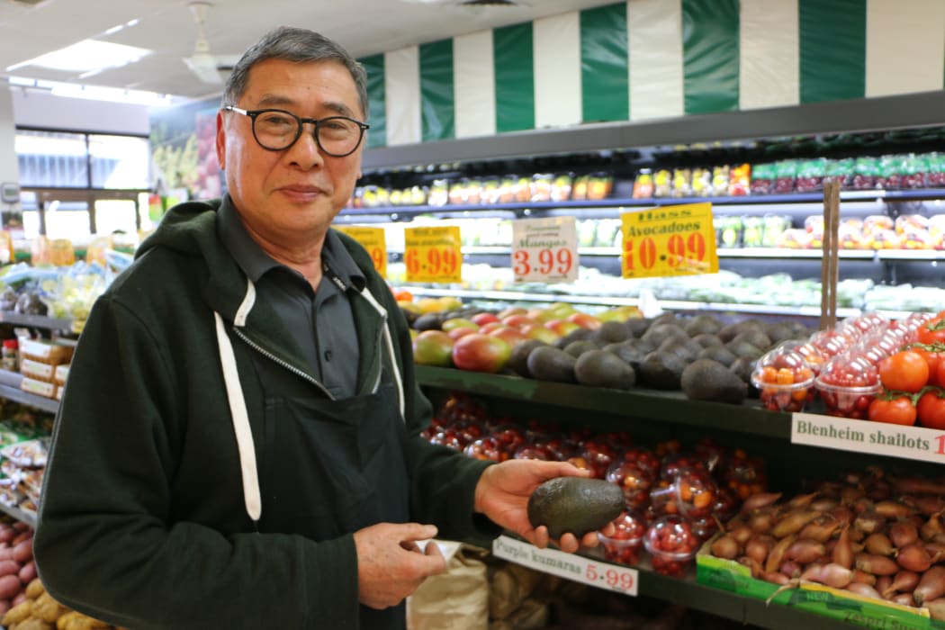 Avocados for sale at $10.99 each in Jack Lum's Auckland greengrocery.