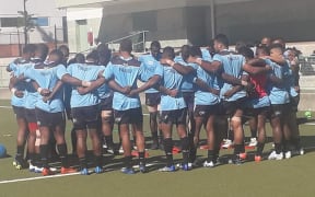 Fijian Drua players huddle together during the captain's run in Canberra.