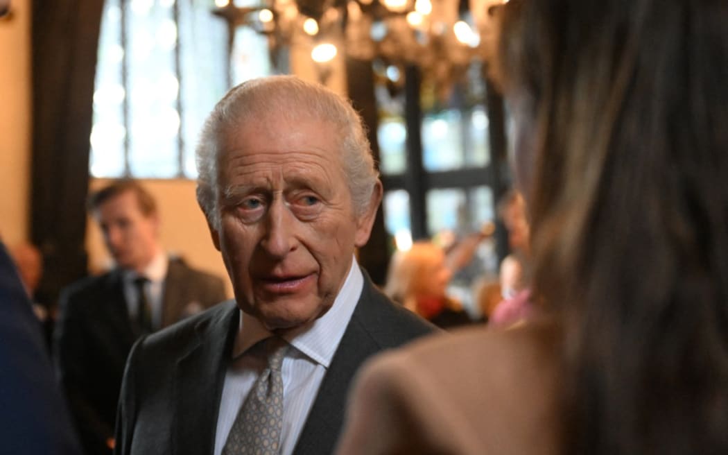 Britain's King Charles III meets guests during a visit to the 700-year-old medieval manor Samlesbury Hall in Preston, north-west England on February 9, 2026.