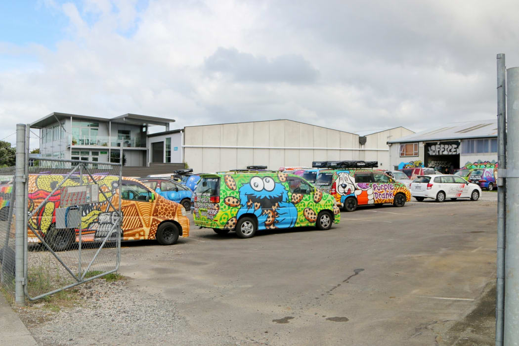 Wicked campervans parkedup at the company's yard.