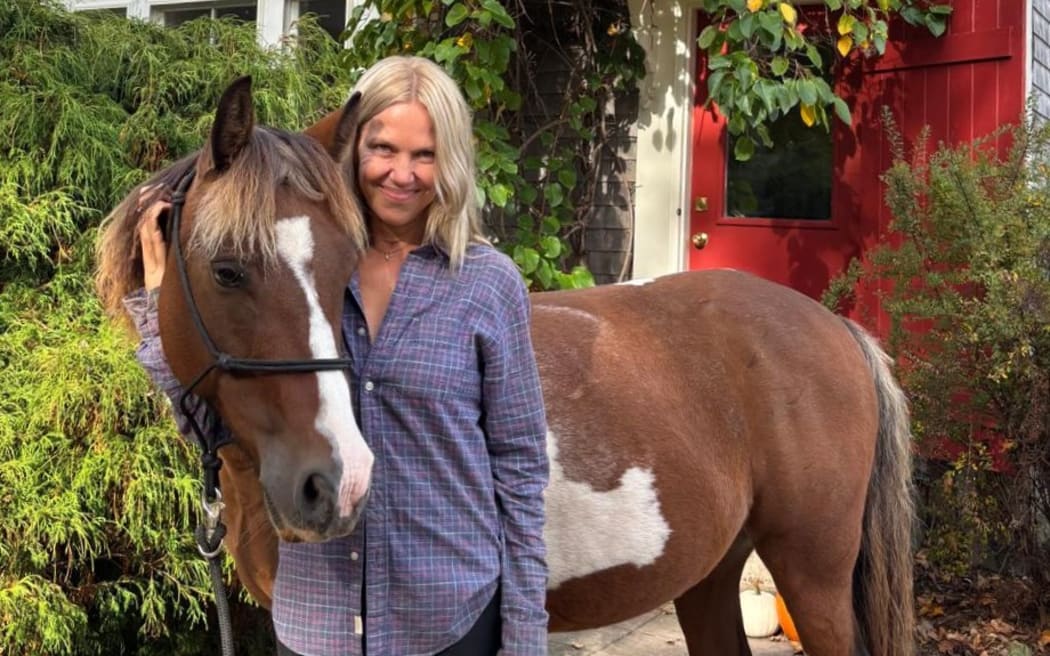 Author Amelia Thomas with her horse