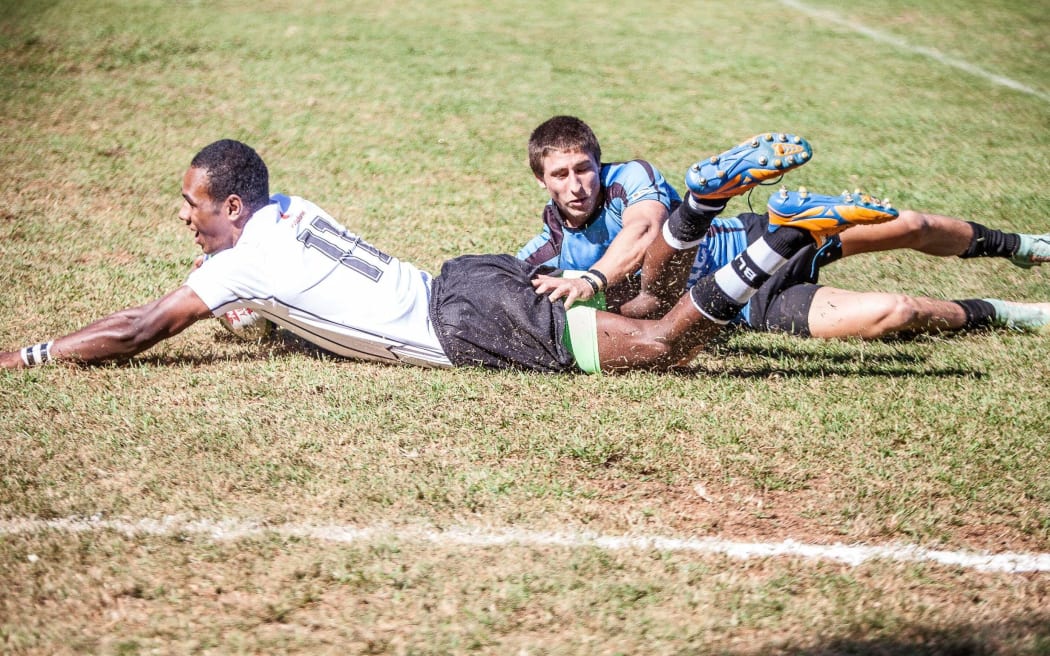 Viliame Tuidraki scores for Fiji in their come from behind win over Uruguay.