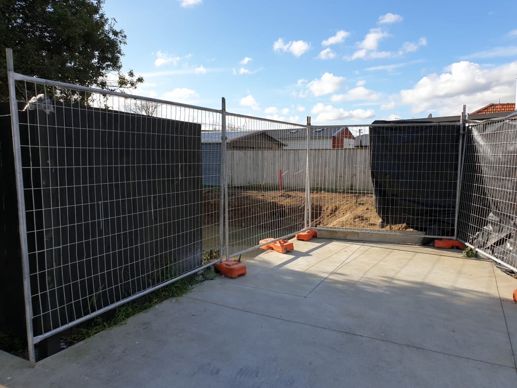 Temporary fencing in place in late July.