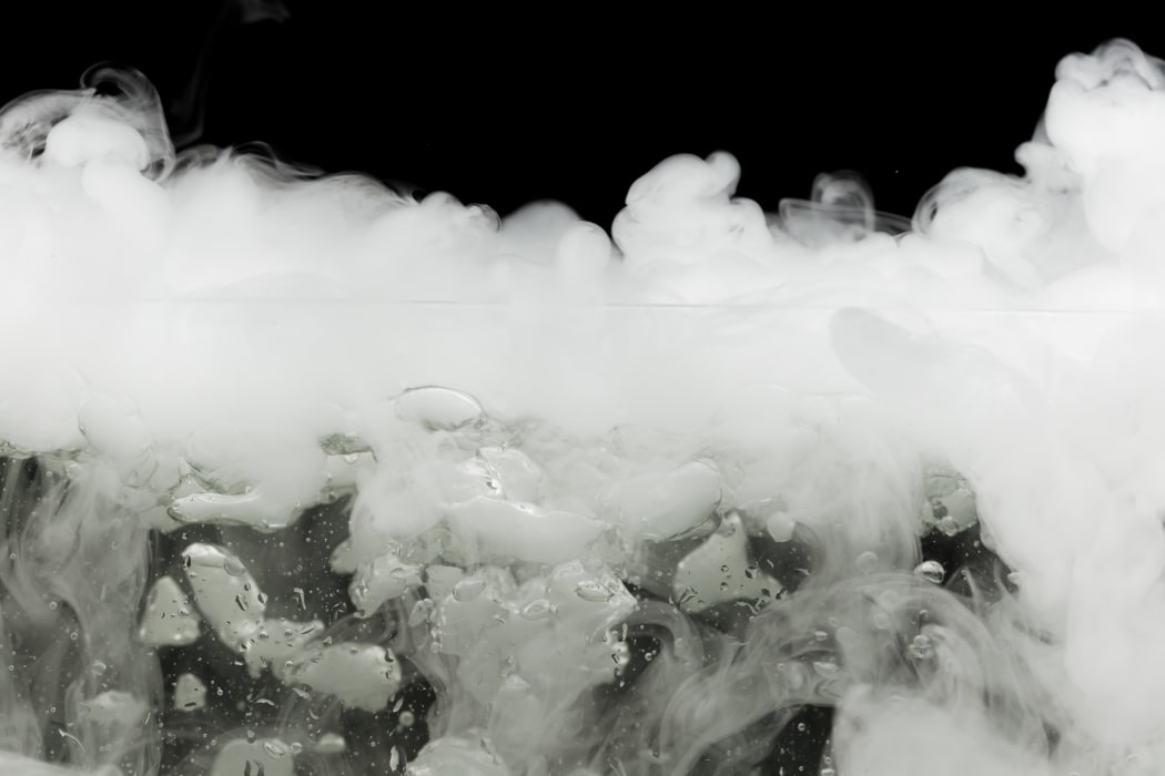 boiling dry ice with vapor, closeup view