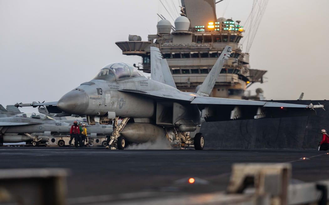 This May 2 photo from the US Navy shows a F/A-18F Super Hornet preparing for launch on the USS Harry S. Truman.