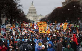 WASHINGTON, DC - MARCH 10: Protesters march during a demonstration against the Dakota Access Pipeline on March 10, 2017 in Washington, DC. Thousands of protesters and members of Native nations marched in Washington DC to oppose the construction of the proposed 1,172 Dakota Access Pipeline that runs within a half-mile of the Standing Rock Sioux reservation in North Dakota.   Justin Sullivan/Getty Images/AFP (Photo by JUSTIN SULLIVAN / GETTY IMAGES NORTH AMERICA / Getty Images via AFP)