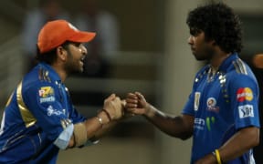 The Mumbai Indian Premier League cricketers celebrate their win over Chennai.