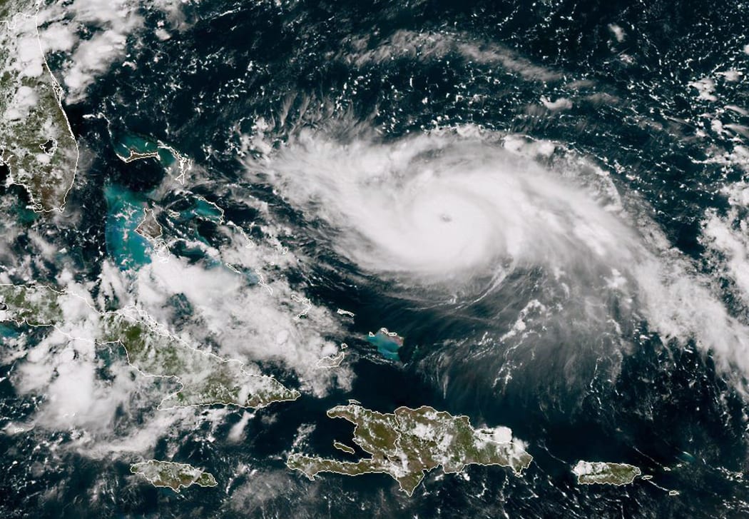 This satellite image obtained from NOAA/RAMMB, shows Tropical Storm Dorian as it approaching the Bahamas and Florida at 17:40 UTC on August 30, 2019.