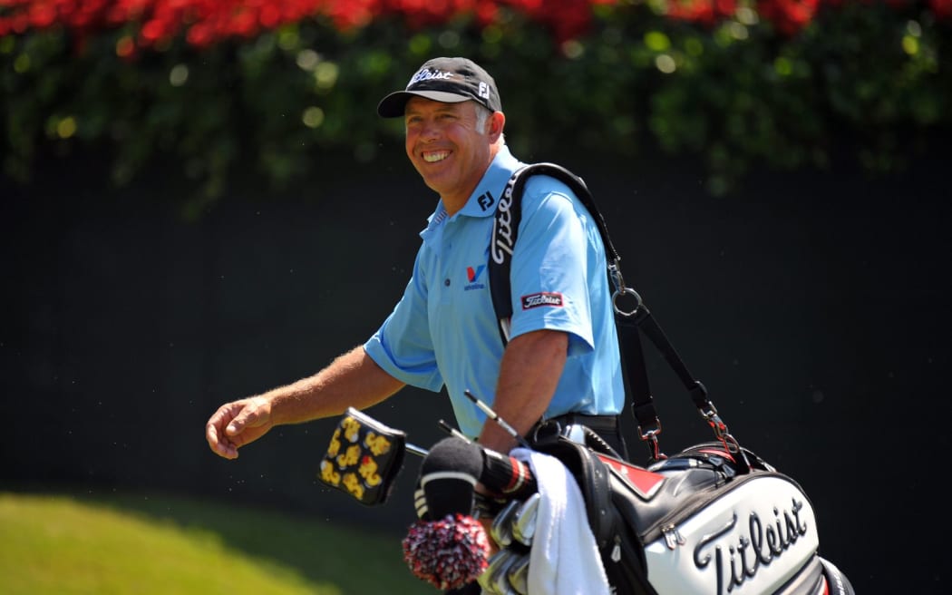 Steve Williams caddies for Adam Scott at the 2013 Tour Championship in Atlanta, Georgia.