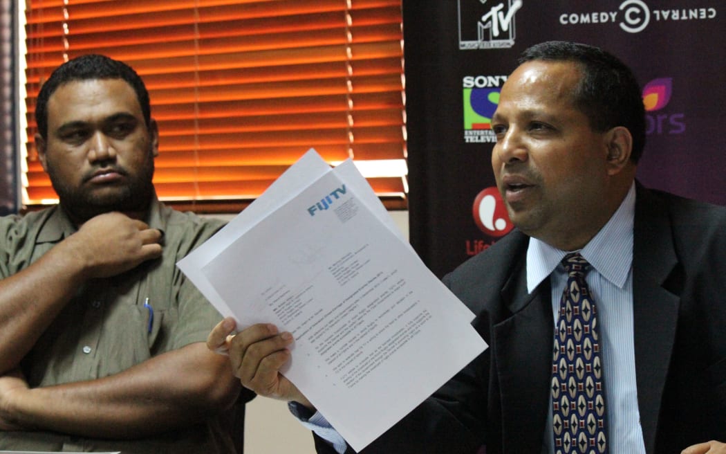 Fiji TV director and CEO of Fijian Holdings Nouzab Fareed, right, and acting CEO of Fiji TV, Geoffrey Smith.