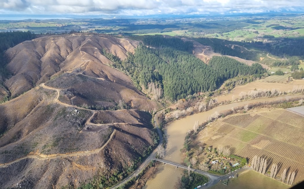 The Motueka River, with Alexander Bluff Bridge in the centre, after flooding in the Tasman region in June 2025.