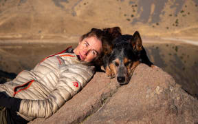 Lucy Barnard, accompanied by her dog Wombat, lies at the center of the Nevado de Toluca crater in the State of Mexico.