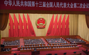 (FILES) This file photo taken on March 8, 2019 shows a general view of the second plenary session of the National People's Congress (NPC) at the Great Hall of the People in Beijing.