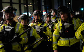 Minnesota State Patrol officers are seen during a protest and noise demonstration calling for an end to federal immigration enforcement operations in the city, in Minneapolis on January 9, 2026.