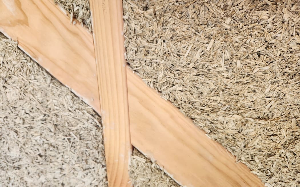 A close-sup of the material which makes up hempcrete. It forms the walls of Kai Rotorua's new storage unit for kūmara