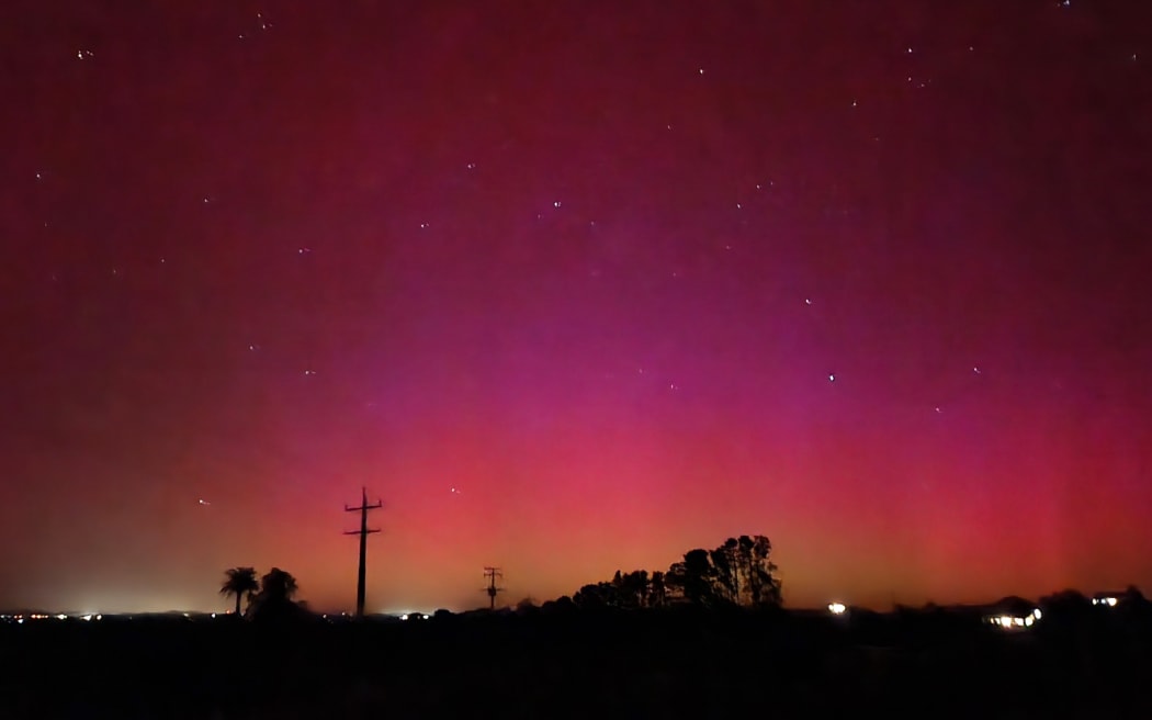 Aurora lights up the sky in Mercer, Auckland on 11 May, 2024.