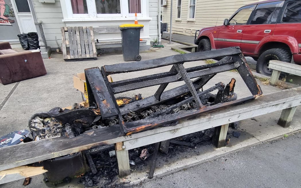 A burnt out couch on Cumberland Street (SH1) in Dunedin.