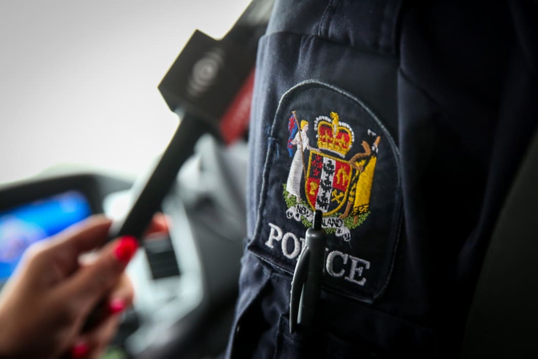 RNZ doing a story with police on forensics.